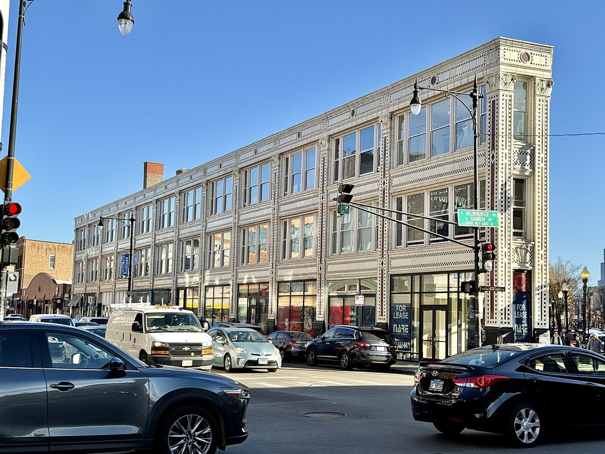 the triangular Flat Iron Arts Building in Wicker Park