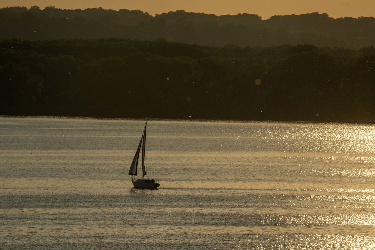 Geneva Lake shoreline with mansions and sailboats in Lake Geneva, Wisconsin