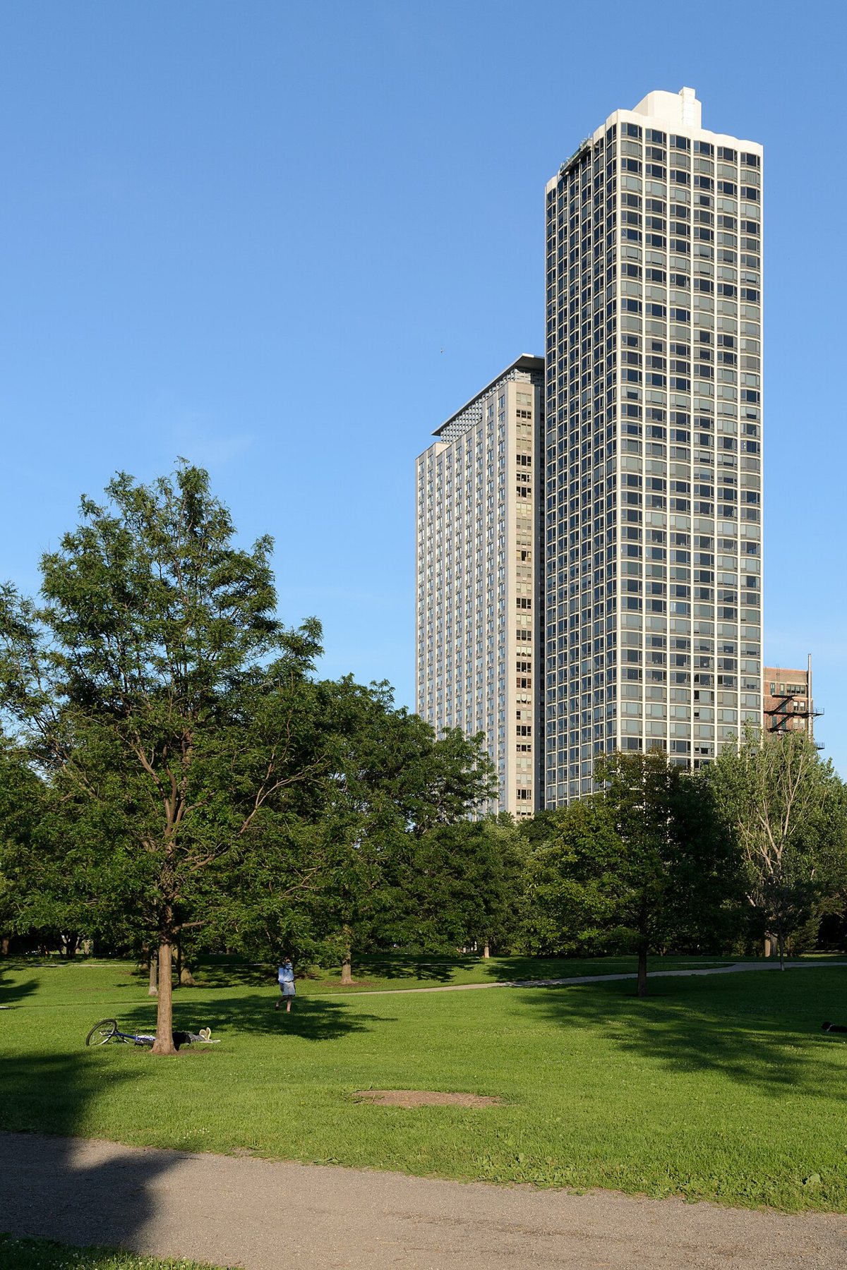 Lincoln Park lagoon path lined with trees near North Pond
