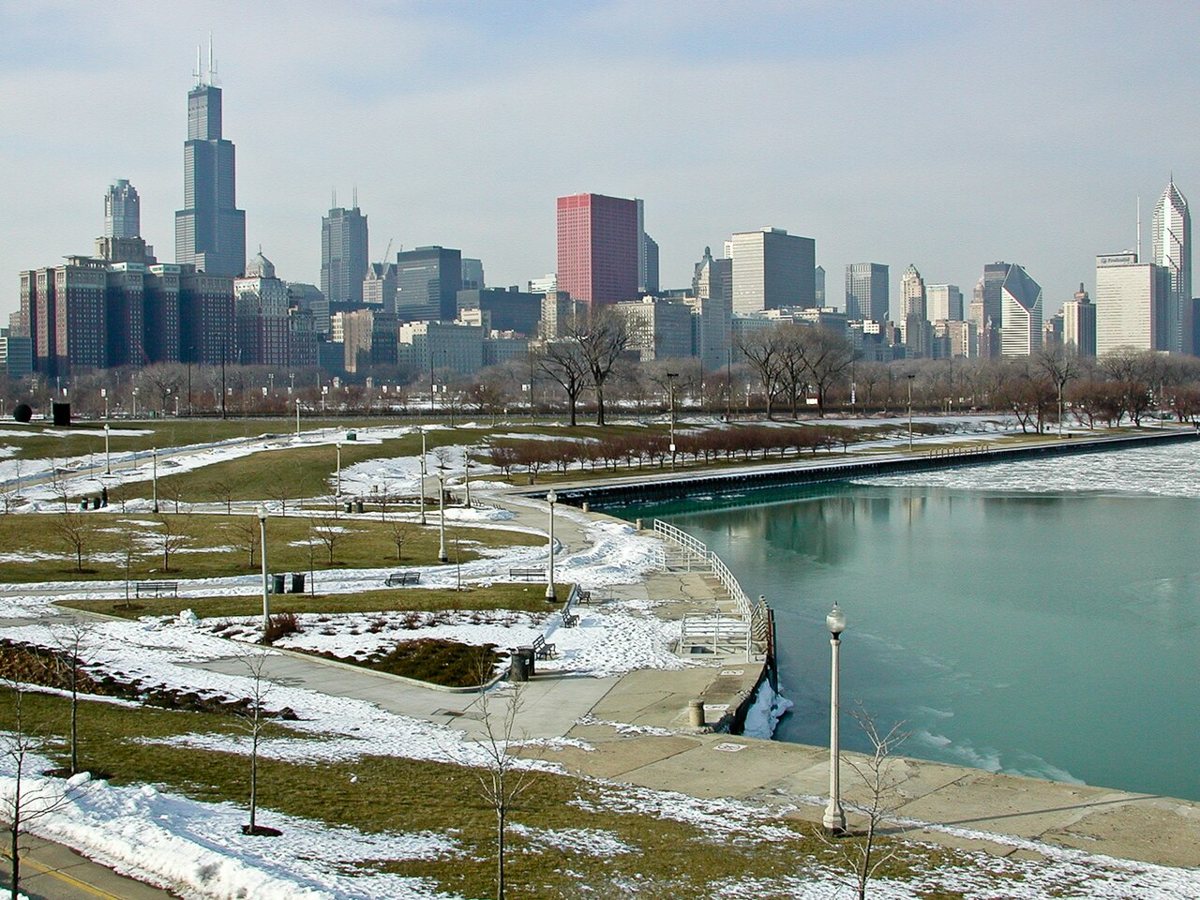 Museum Campus Chicago with the skyline visible across the harbor at dusk