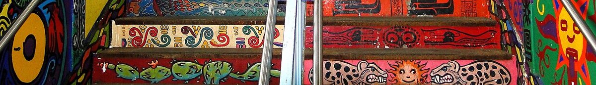 Colorful street murals on building walls in the Pilsen neighborhood of Chicago
